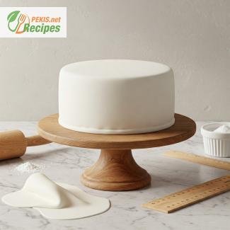 ¿Cuánto fondant se necesita para cubrir una tarta?