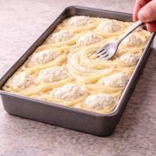 Baking pan with two clearly visible mixtures and shallow swirls on top