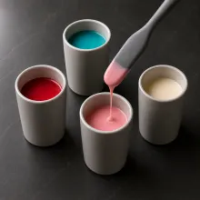 Colored coating falls in a smooth ribbon with satin sheen and no grainy streaks